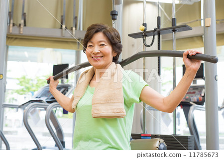 Senior women exercising at the fitness club 11785673
