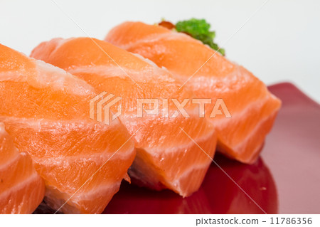 Japanese sushi traditional japanese food.Roll made of salmon, re Japanese sushi traditional japanese food.Roll made of salmon, re 11786356