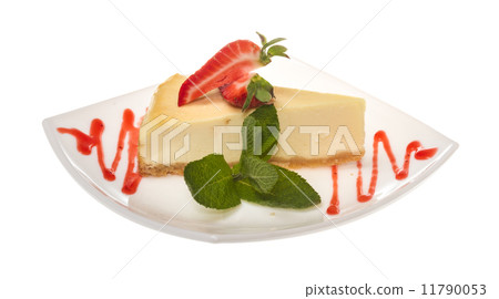 a piece of strawberry cheesecake on whit 11790053