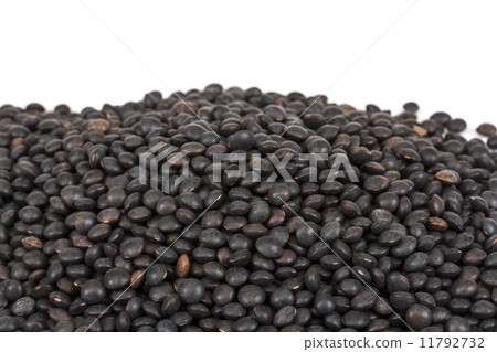 Heap of black lentil isolated on white 11792732