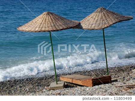 Two umbrella at the beach Two umbrella at the beach 11803499