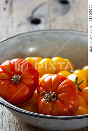 Beef tomatoes in a bowl Beef tomatoes in a bowl 11805992