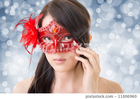 woman in a carnival mask woman in a carnival mask 11806960