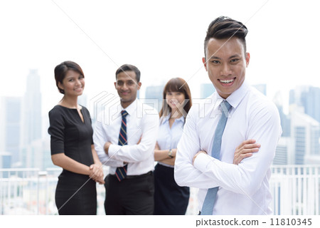 Chinese team leader of successful young asian mixed race corporate executive  11810345