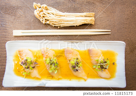 Pieces of white tuna with herbs and sauce Pieces of white tuna with herbs and sauce 11815173