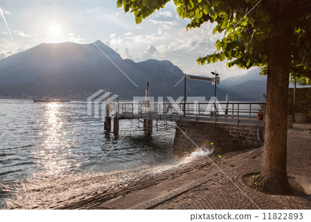View of Como lake on sunset with pier in Italy 11822893
