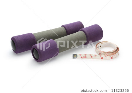 Two dumbbell and measure tape isolated on white background Two dumbbell and measure tape isolated on white background 11823266