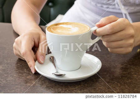 Morning coffee. Cup of Cappuccino in Cafe Morning coffee. Cup of Cappuccino in Cafe 11828784