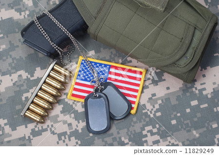 US ARMY concept with handgun on camouflage uniform 11829249