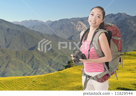 backpacker with camera backpacker with camera 11829544