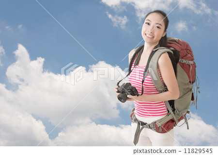 backpacker with camera 11829545