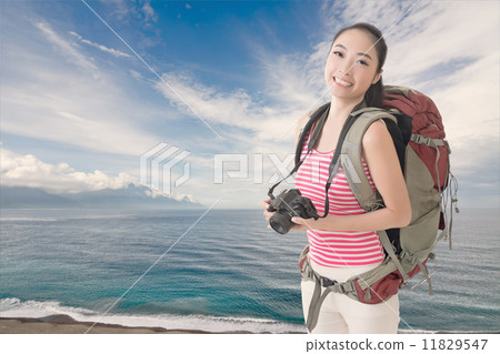 backpacker with camera backpacker with camera 11829547