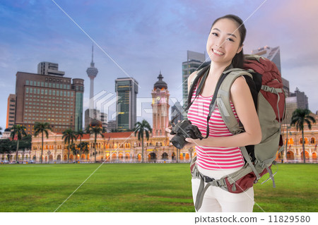 backpacker with camera backpacker with camera 11829580