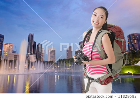 backpacker with camera backpacker with camera 11829582