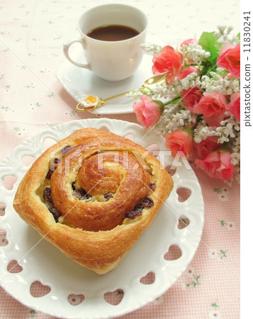 Breakfast image Raisin's Danish bread and coffee Breakfast image Raisin's Danish bread and coffee 11830241