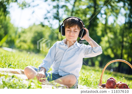 Boy enjoying music 11837610