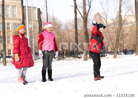 Children in Winter Park playing snowballs Children in Winter Park playing snowballs 11838186