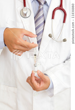 A doctor holding injector 11838860