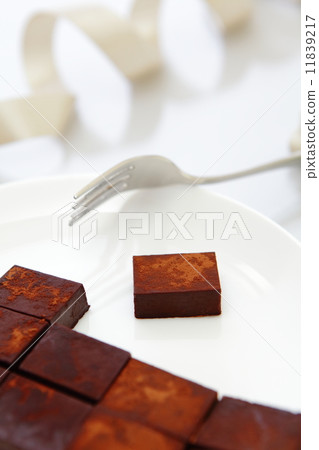 delicious handmade sweet chocolate with metal fork delicious handmade sweet chocolate with metal fork 11839217
