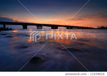 beautiful sunset with a bridge 11839628