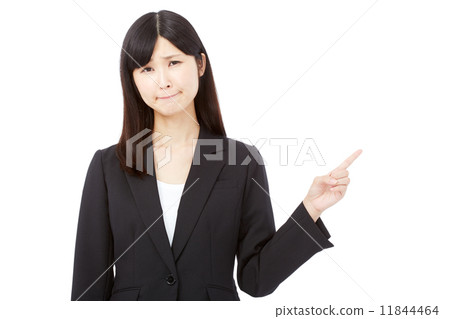 Pointing troubled business woman 11844464