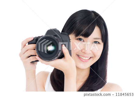 A woman with a camera A woman with a camera 11845653