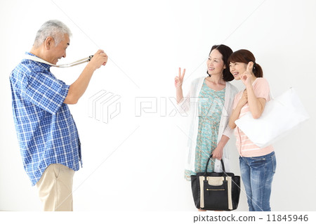 Parents taking photographs on the go 11845946