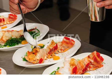 Decorating cooked lobster on plate Decorating cooked lobster on plate 11846198
