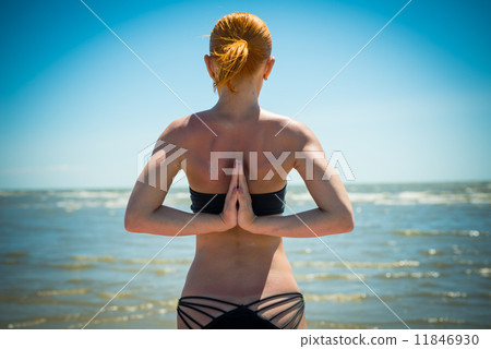 Woman doing yoga reverse namaste Woman doing yoga reverse namaste 11846930