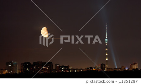 half moon over TV tower and city in summer night 11851287
