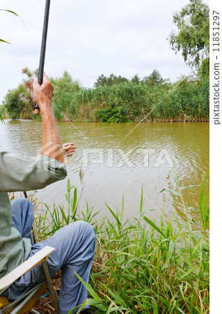 fisherman fished out small rudd fish fisherman fished out small rudd fish 11851297