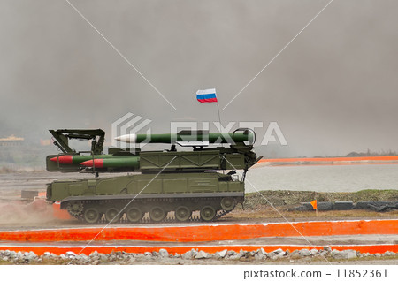 Buk-M1-2 surface-to-air missile systems in smoke 11852361