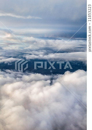 Cloudscape vertical background with heapy clouds. 11853223