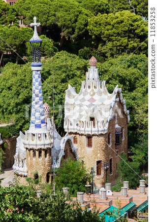 Barcelonas Park Guell entrance pavilions in sunny day. Spain. 11853258