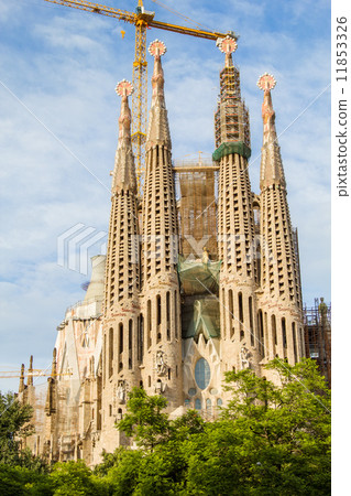 Famous Sagrada Familia cathedral facade in Barcelona, Spain. 11853326