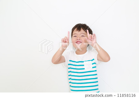 A boy pointing at a point A boy pointing at a point 11858116