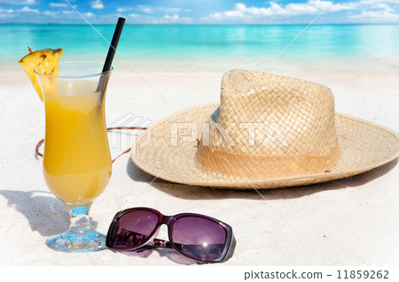 Pineapple cocktail and straw hat Pineapple cocktail and straw hat 11859262