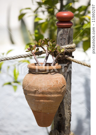 flower pots on a wooden post turquoise, vacation 11860297