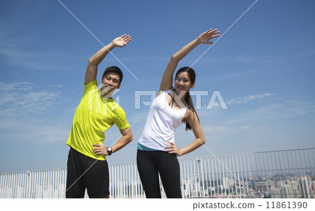 Young Asian Adults exercising 11861390