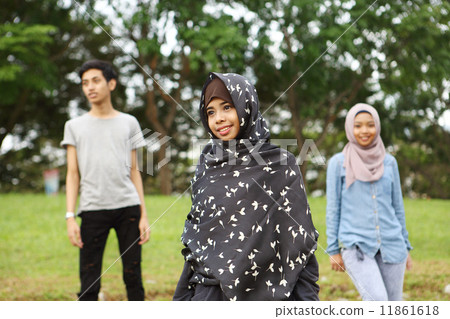 Three Asians in the park 11861618