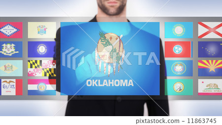 Hand pushing on a touch screen interface 11863745