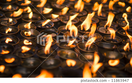 large group of Candles at Buddhist temple large group of Candles at Buddhist temple 11863947