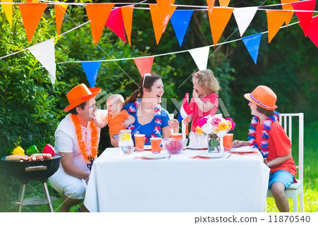 Dutch family having grill party Dutch family having grill party 11870540
