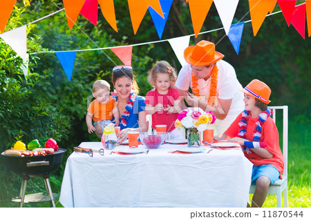Dutch family having grill party Dutch family having grill party 11870544