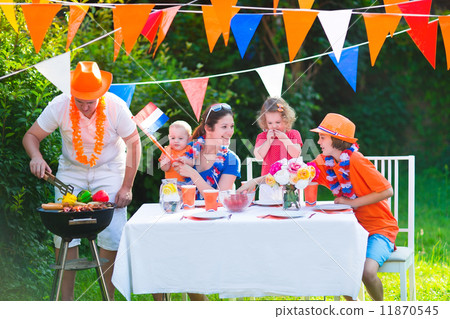 Dutch family having grill party Dutch family having grill party 11870545