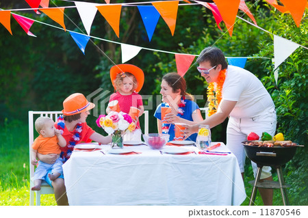 Dutch family having grill party Dutch family having grill party 11870546