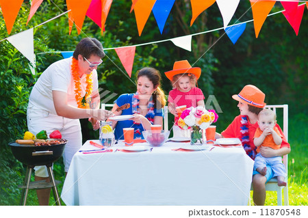 Dutch family having grill party Dutch family having grill party 11870548