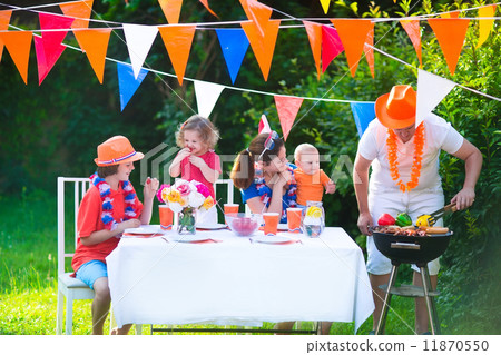 Dutch family having grill party Dutch family having grill party 11870550