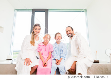 Family sitting together on bathtub 11870895