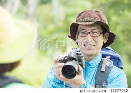 Men taking pictures 11877080